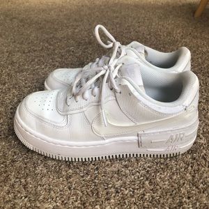 Nike Air Force 1s shadows